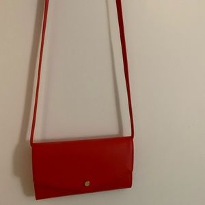 super cute never used crossover red bag